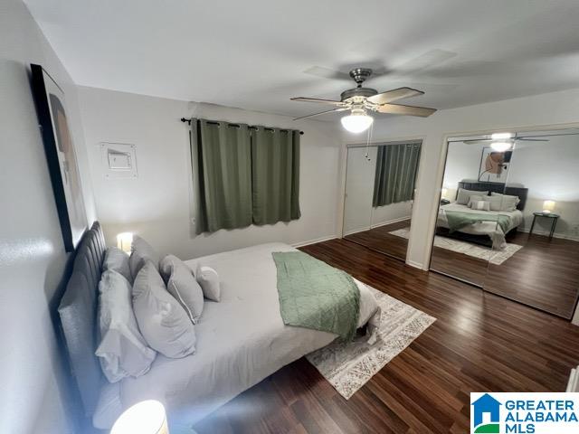 bedroom featuring ceiling fan and dark hardwood / wood-style flooring