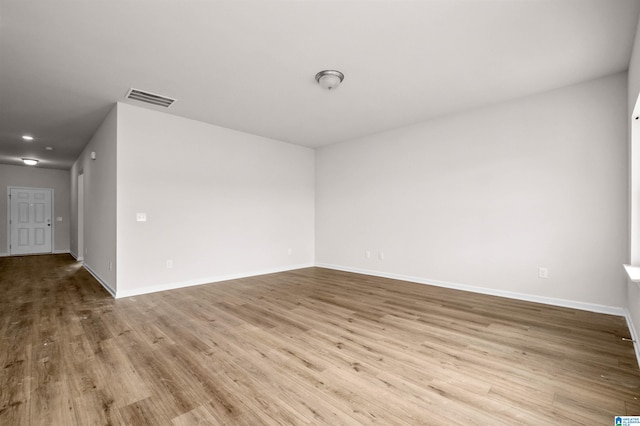 unfurnished room featuring light hardwood / wood-style flooring