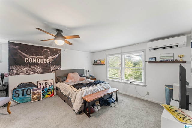 bedroom featuring an AC wall unit, carpet flooring, and ceiling fan