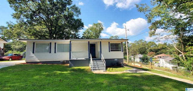 view of front of home with a front yard