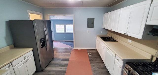 kitchen with dark wood-type flooring, white cabinets, and appliances with stainless steel finishes