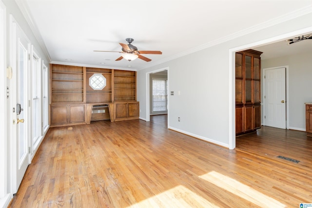 unfurnished living room with crown molding, light hardwood / wood-style flooring, and ceiling fan