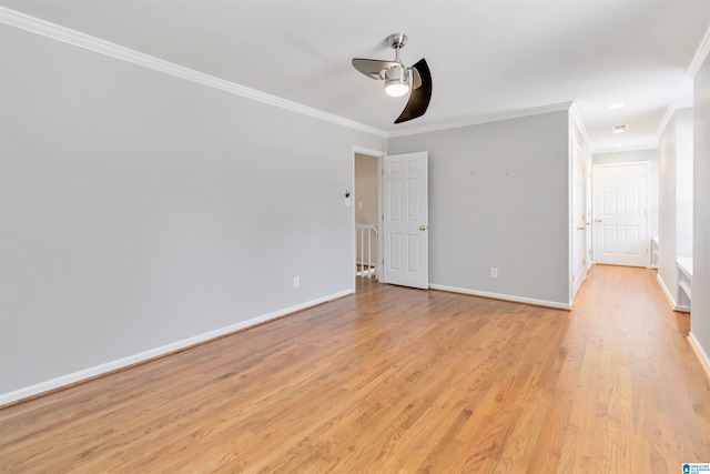 unfurnished room featuring ornamental molding, ceiling fan, and light hardwood / wood-style floors