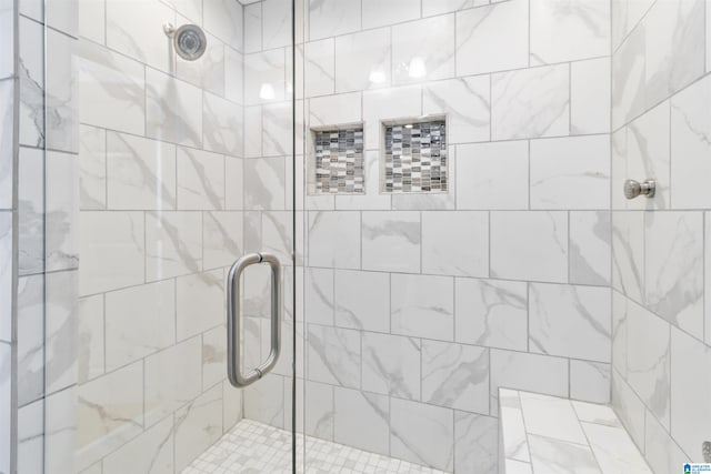 bathroom featuring an enclosed shower