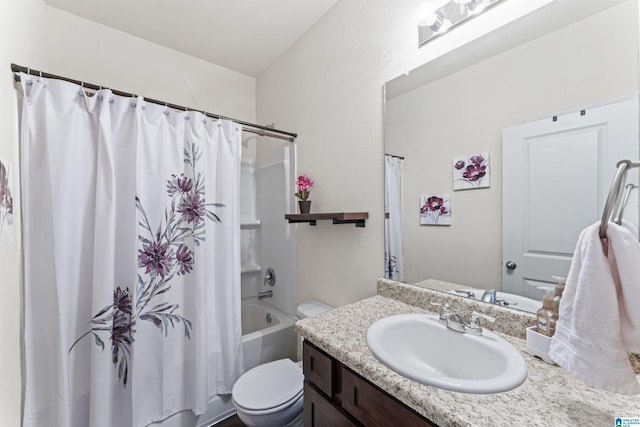 bathroom featuring toilet, vanity, and shower / bath combo with shower curtain