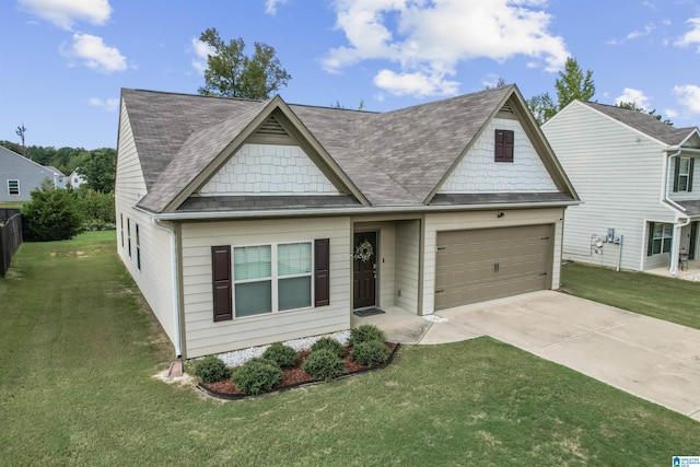 view of front of house featuring driveway, a front lawn, an attached garage, and roof with shingles