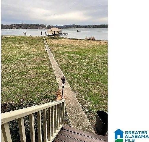 3195 County Road 67, Scottsboro, AL 35769 - view of grassy yard with a water view