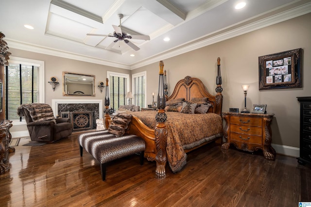 bedroom with ornamental molding, dark wood-type flooring, and ceiling fan