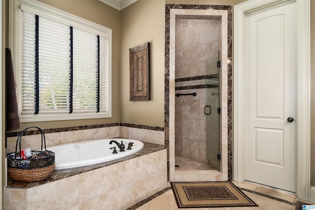 bathroom with ornamental molding, tile patterned flooring, and plus walk in shower