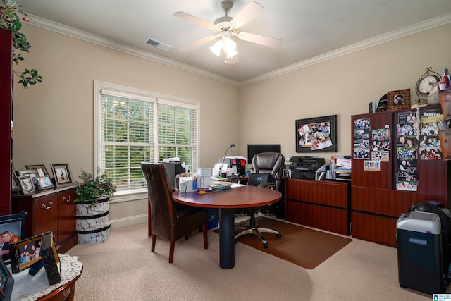 carpeted office with ceiling fan and ornamental molding