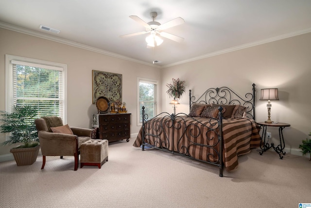 bedroom with multiple windows, carpet floors, and ceiling fan