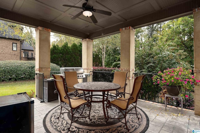 view of patio / terrace featuring area for grilling and ceiling fan