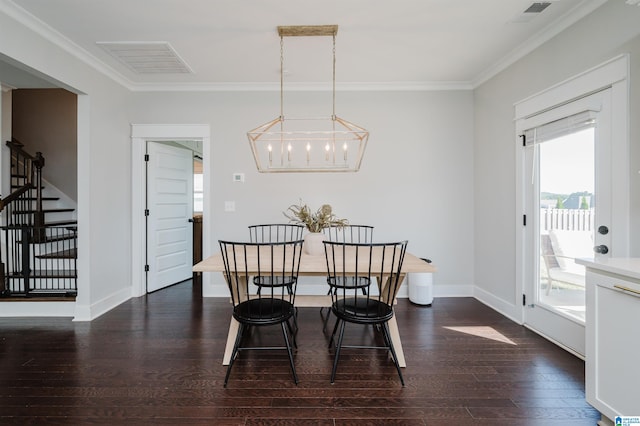 dining room with crown molding, an inviting chandelier, and dark hardwood / wood-style flooring