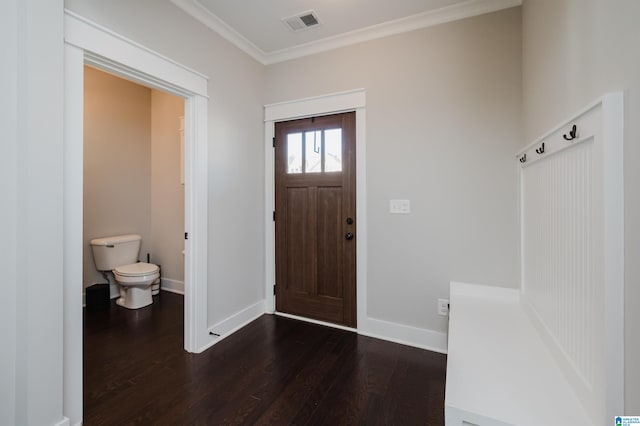 entrance foyer with dark wood-type flooring and crown molding