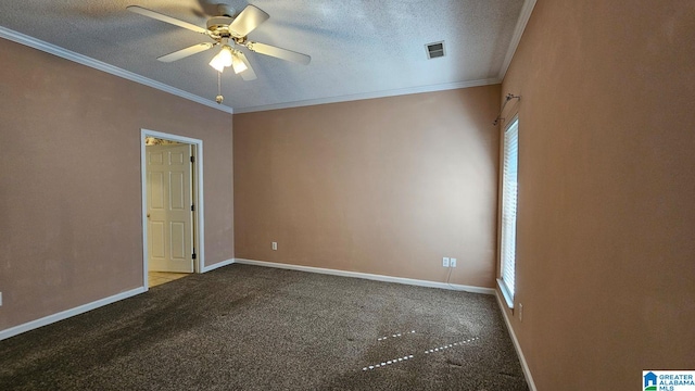 carpeted spare room featuring ceiling fan, a textured ceiling, and crown molding