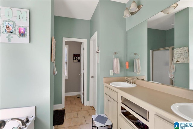 bathroom featuring vanity, plus walk in shower, and tile patterned flooring