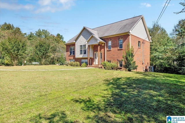 bi-level home with a front yard