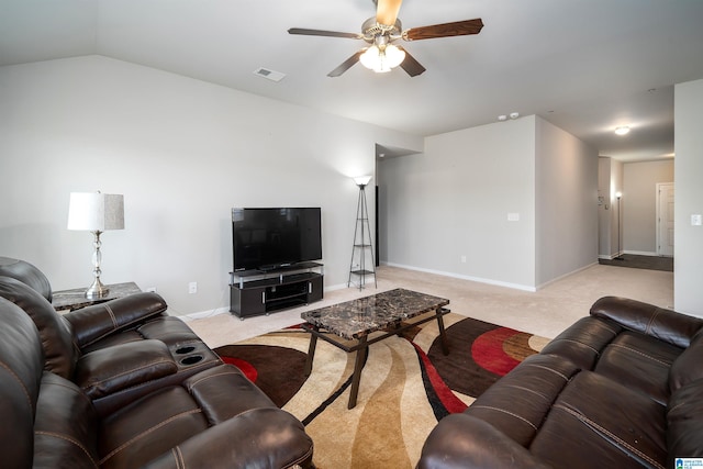 living room with ceiling fan, light colored carpet, and lofted ceiling