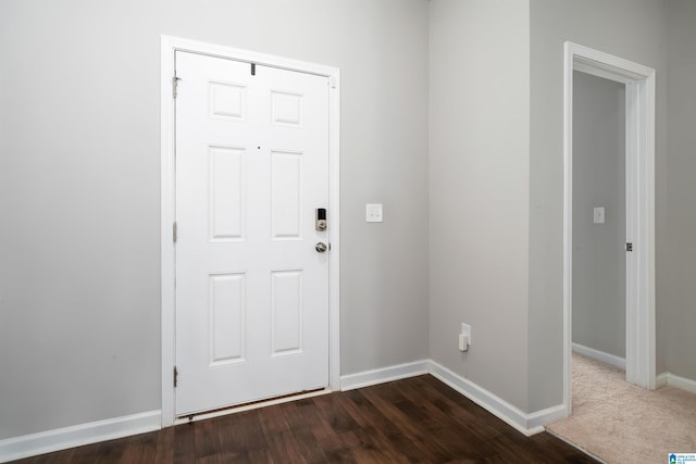 foyer with dark hardwood / wood-style flooring