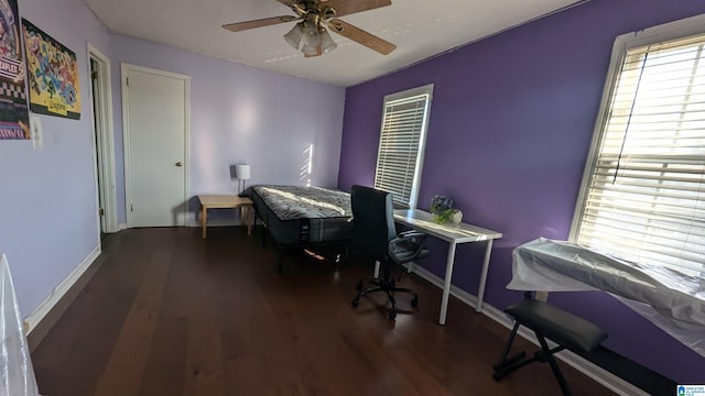 office area with dark hardwood / wood-style floors and ceiling fan