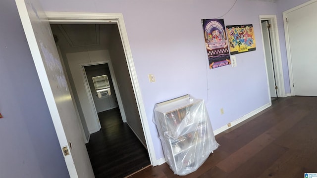 hall with dark hardwood / wood-style flooring