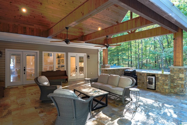 view of patio / terrace featuring ceiling fan, a grill, french doors, and an outdoor living space