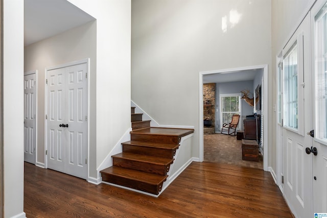 foyer with dark wood-type flooring