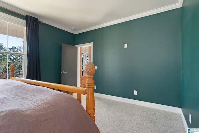 carpeted bedroom with crown molding