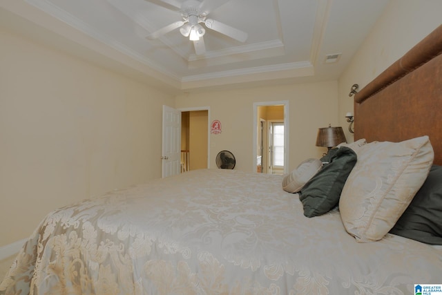 bedroom featuring crown molding, ceiling fan, and a raised ceiling