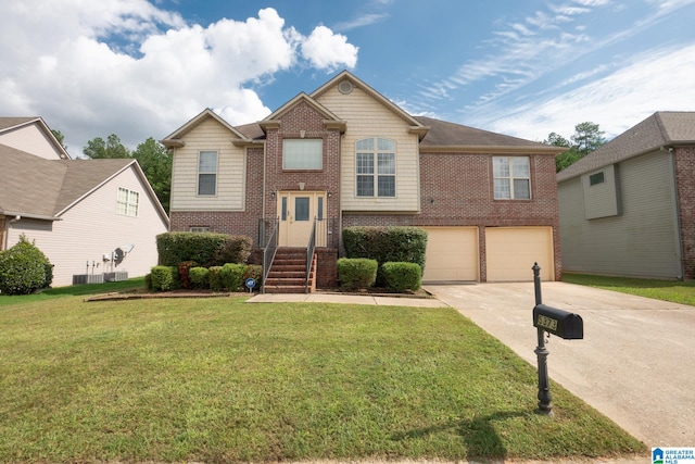 view of front facade featuring a garage and a front lawn