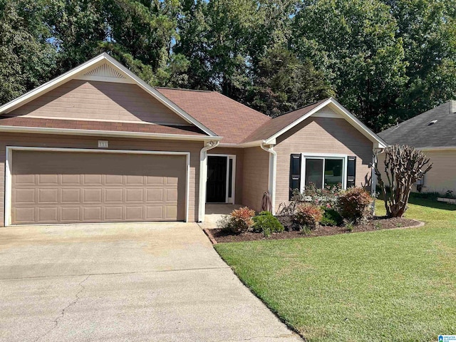 ranch-style house with a front lawn and a garage