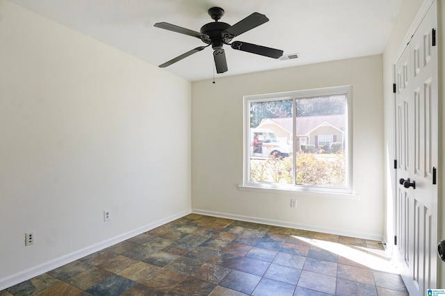 empty room featuring ceiling fan