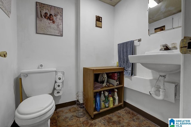 bathroom featuring toilet