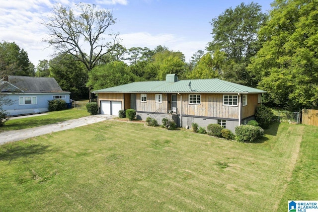 single story home featuring a front yard and a garage