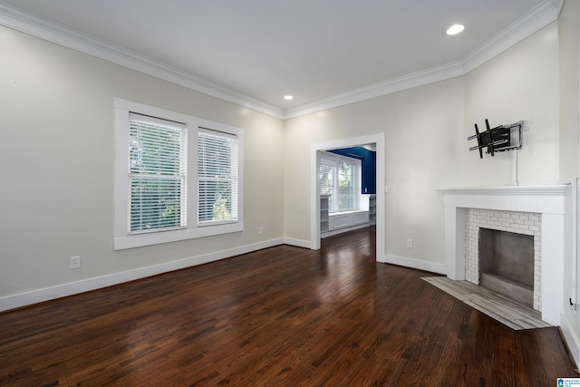 unfurnished living room with crown molding and dark hardwood / wood-style flooring