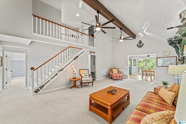 living room with light carpet, high vaulted ceiling, and beam ceiling