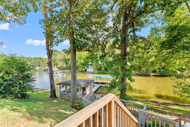 exterior space featuring a yard and a water view