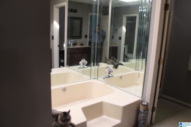 bathroom with a bathing tub