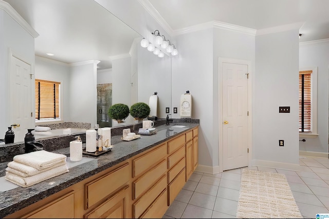 bathroom with vanity, crown molding, walk in shower, and tile patterned flooring