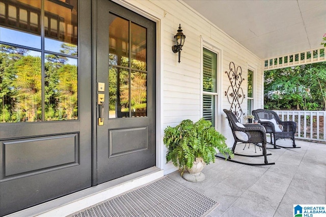 doorway to property with covered porch