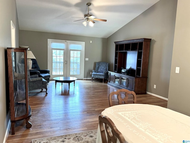 living room featuring french doors, lofted ceiling, dark hardwood / wood-style floors, and ceiling fan