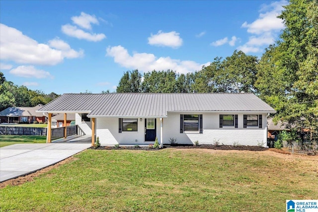 ranch-style home with a front yard