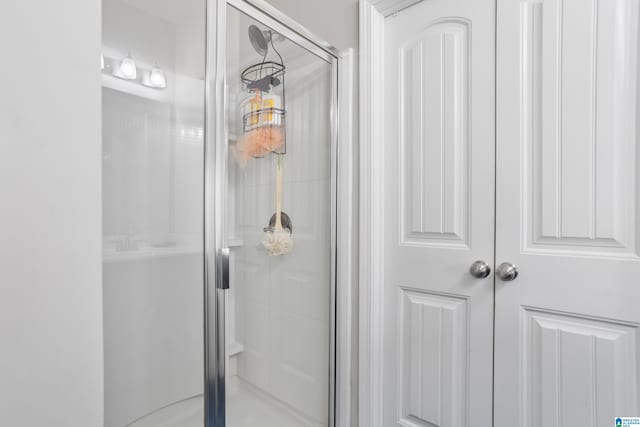 bathroom featuring an enclosed shower