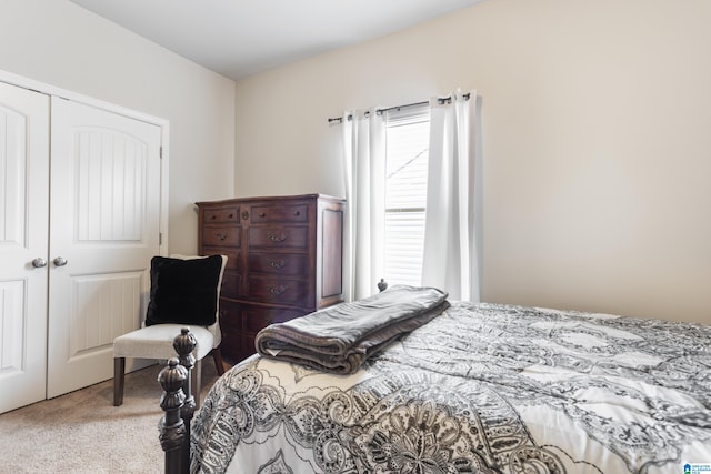 carpeted bedroom with a closet