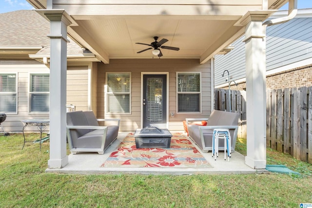 view of patio with ceiling fan and an outdoor living space