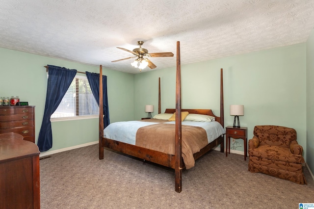 bedroom with carpet flooring, a textured ceiling, and ceiling fan