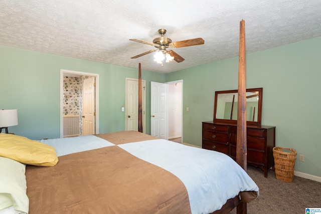 carpeted bedroom featuring ensuite bathroom, ceiling fan, and a textured ceiling