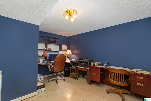 office with a textured ceiling