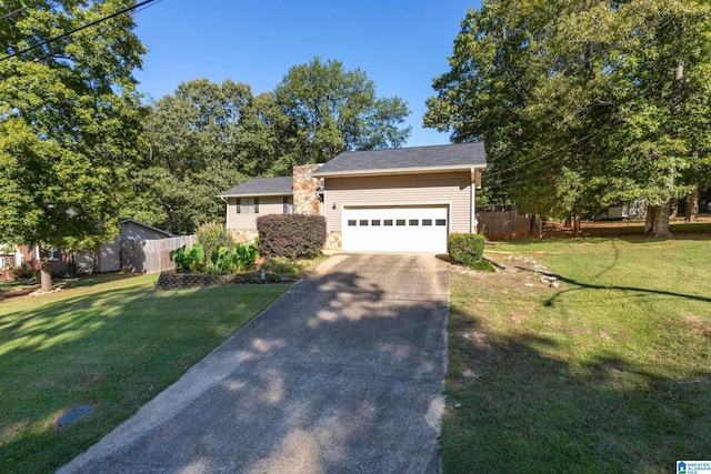 view of front facade featuring a garage and a front yard