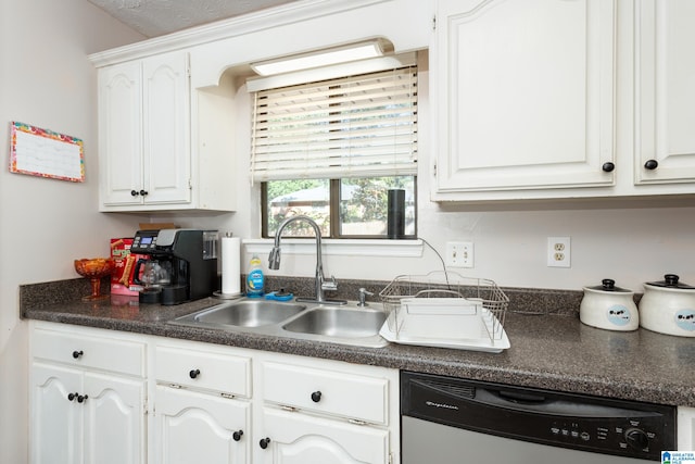 kitchen with dishwasher, white cabinets, and sink